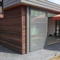 Béton imprimé autour de véranda à Thumaide